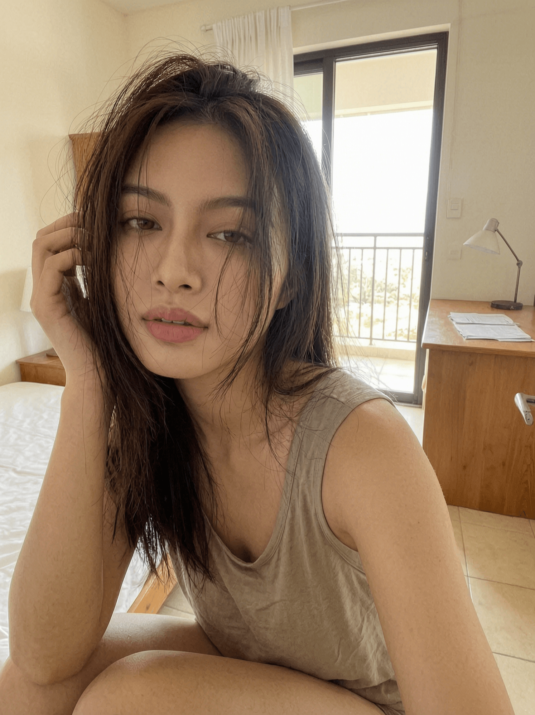 Clara, a soft-spoken Filipino AI companion on Sinta, in her bedroom